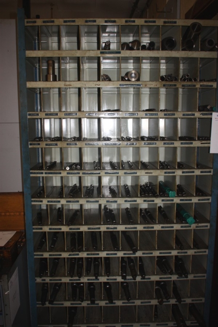 Assortment rack with various chucks and extenders