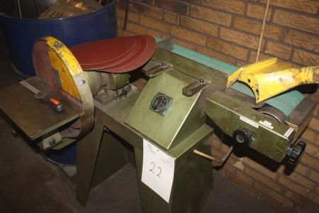 Combined horizontal belt sander and end grinder on a tripod and various sanding belts on wall