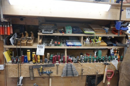 Contents above file bench of various hand tools