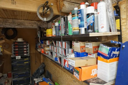 Contents on 2 shelves of various screws, nails, lubricants, oils, etc.