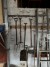 Various handles, shovels and brooms + 18-step ladder