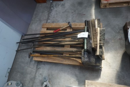 Lot of brooms and shovels