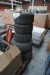Various spare parts and tires for garden tractors