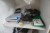 Contents in cupboard of various gloves, suction cups etc.