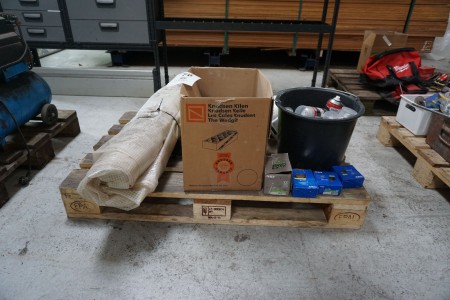 Pallet with various screws, safety helmets, gloss spray, etc.