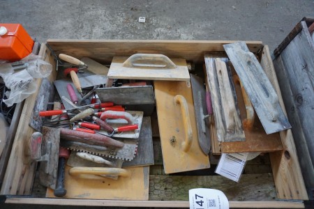 Pallet with various masonry tools