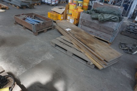 Various wooden boards + pallet with contents