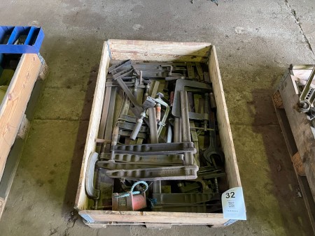 Pallet with various large screw clamps