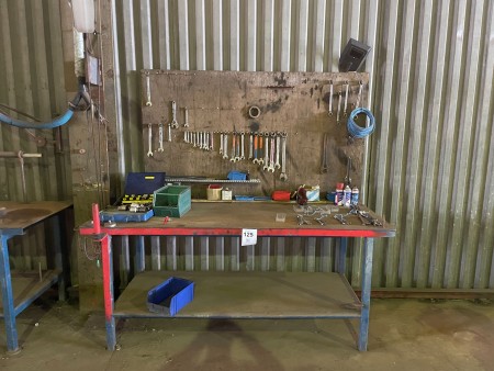 Metal workshop table with contents