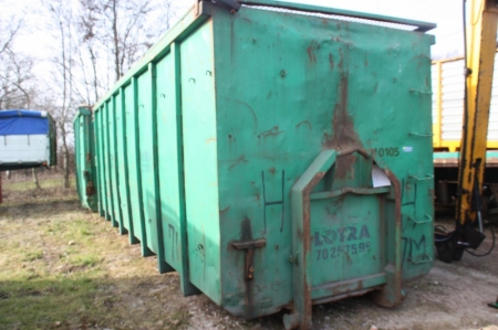 Waste Container, green, approx. 20 feet. Lattice Door. Marked 40105