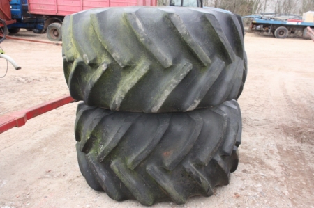 2 tires and rims. Tire size: 750/65 R26