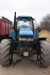 Traktor, New Holland 8360, 4WD. Monteret med hydraulisk frontlift, Zuidberg , SN: 22080410. Årgang 2003. Timer: 4257
