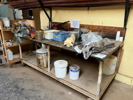 Workshop table on wheels with contents