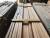 Lot of thermo-treated cladding boards in beech