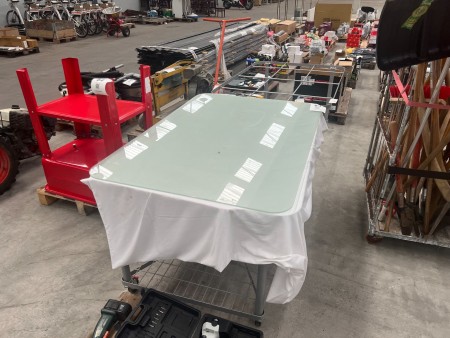 2 pcs. Glass tables with wheels
