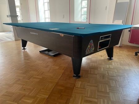 Pool table with built-in table top