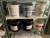 Contents of 1-bay workshop shelf of batch of printing paint for printing