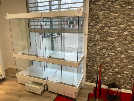 Glass display cases with lights on wheels