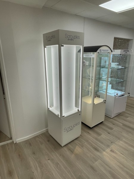 Rotatable glass display case with light on wheels