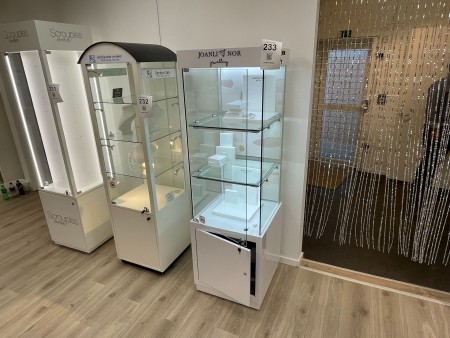 Glass display cases with lights on wheels