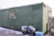 Squad container, demountable. 2 wheelbarrows. Office and canteen. Length approx. 8 meters. Width approx. 3 meters. Locked