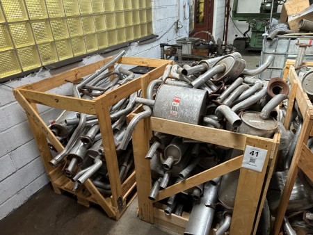 2 pallets with exhaust pipes for cars