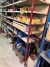 4 compartment workshop shelf containing various spare parts