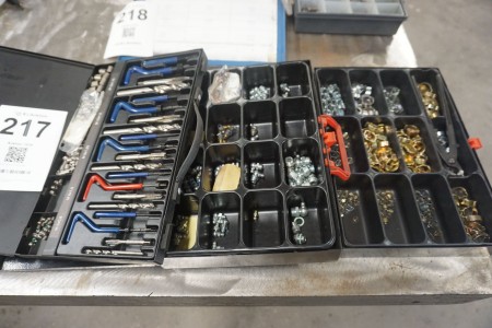 3 pieces. assortment boxes containing various clamping bands, drill bits, etc.