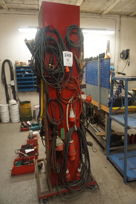 Tool stand on wheels containing various cables