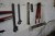 Contents on workshop board of various pipe pliers, spanners, bolt cutters, etc.