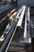 Powered Aluminium Vertical Folding Door, 8 sections. Height app. 4.7 m. Width app. 4.05 m. Insulated sections