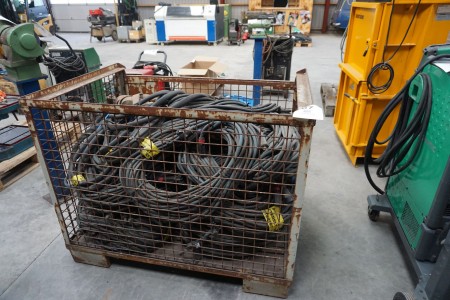 Iron cage with a large batch of welding cables
