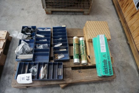 Pallet with various spare parts for welders