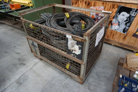Iron cage with a large batch of welding cables
