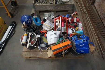 Pallet with various cutting discs, screws, nails, buckets, etc.