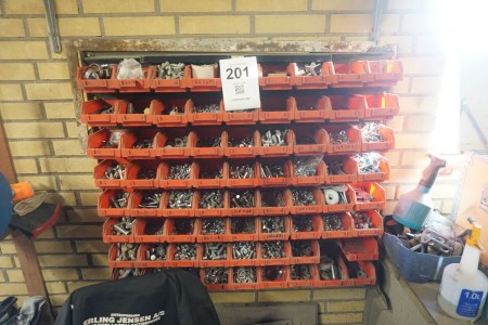 Assortment rack with contents of various bolts, nuts, clamping bands, washers, etc.