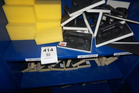 Contents on 3 shelves of various felt boards