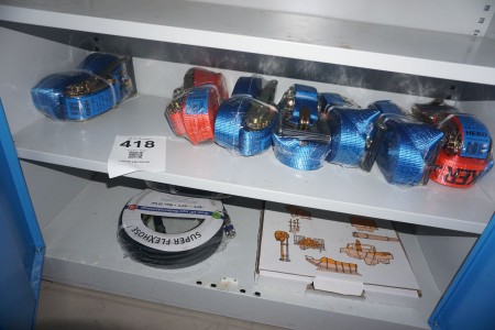 Contents on 2 shelves of various tension straps, air hoses, etc.