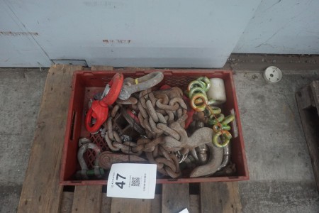 Box with various chains and hooks
