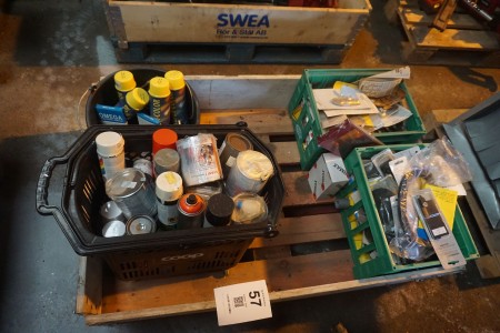 Pallet with various spare parts, spray cans etc.