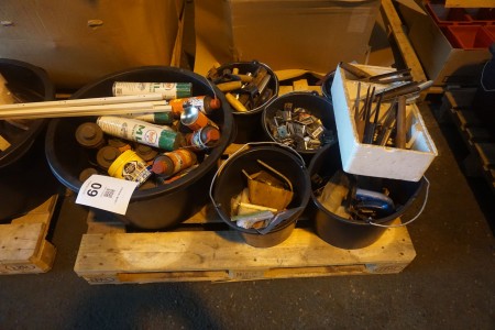 Pallet with various spare parts for hand tools, spray cans etc.