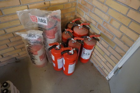 Contents in corner of various fire extinguishers & glass