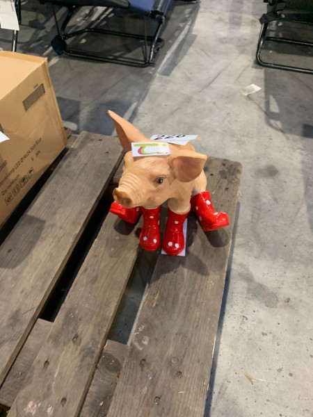 Pig with red boots
