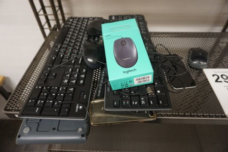 Various keyboards, mouse and iPhone