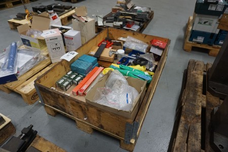 Pallet with various lifting teams, measuring tools, etc.