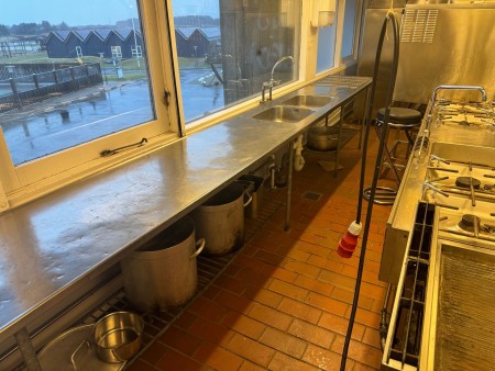 Long work table with double sink in stainless steel