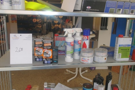 Content on shelf: thinner + paint + primer + gas cans and more