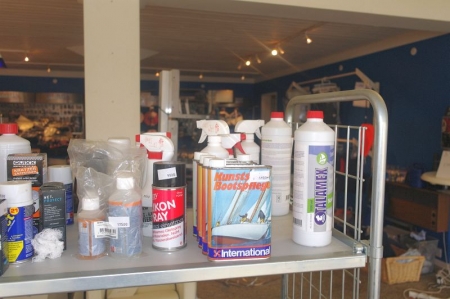 Content on shelf: various consumables for boat care. Trolley included
