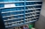 2 range shelving with content + miscellaneous items on shelf and floor