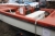 Used dinghy, steering console, LxW: 4.00 mx 1.6 m boat engine: 1997 Mercury 25 HP (with electric start). 2002 Brenderup boat trailer, 500 kg. Hand winch. Reg No JK 9481. Licence plate not included.